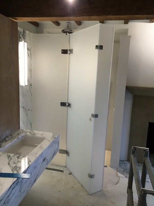 Bespoke frosted glass shower enclosure in Woolwich luxury bathroom
