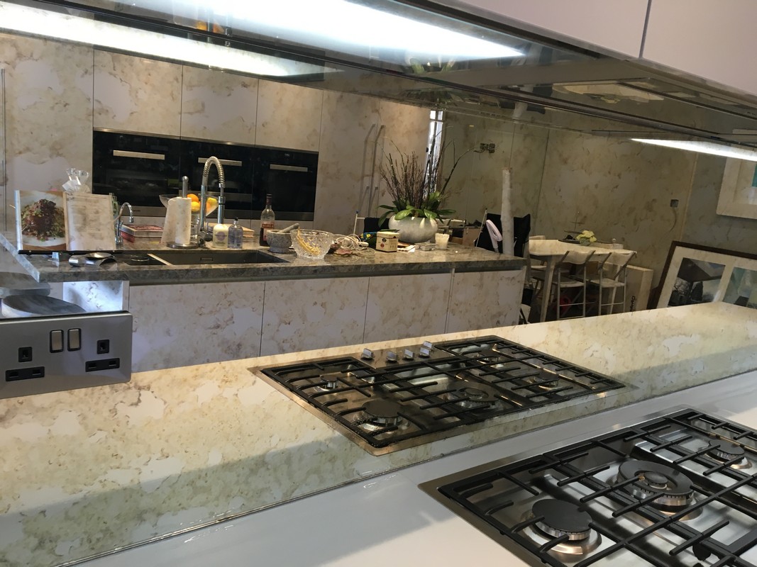 Mirror glass splashback in Woolwich luxury kitchen