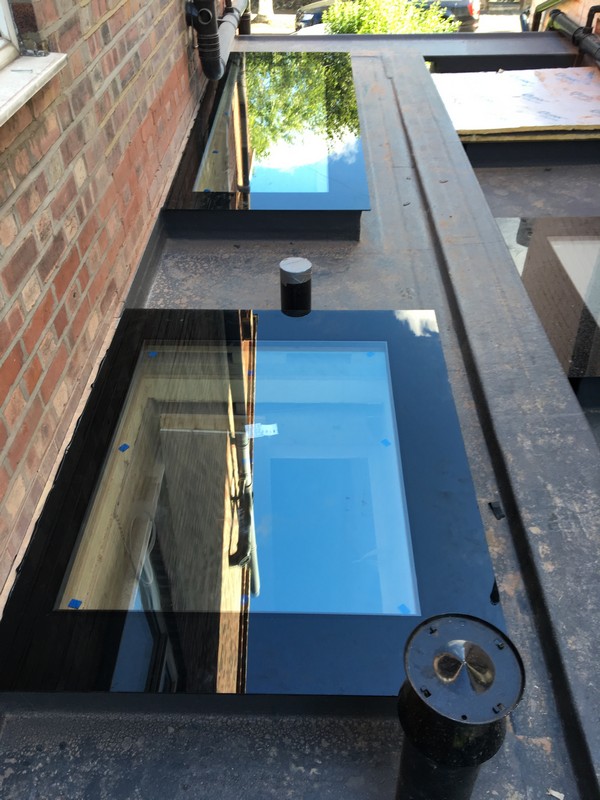 Multiple flat roof skylights on extension in Woolwich